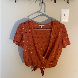 Patrons of peace wrap top